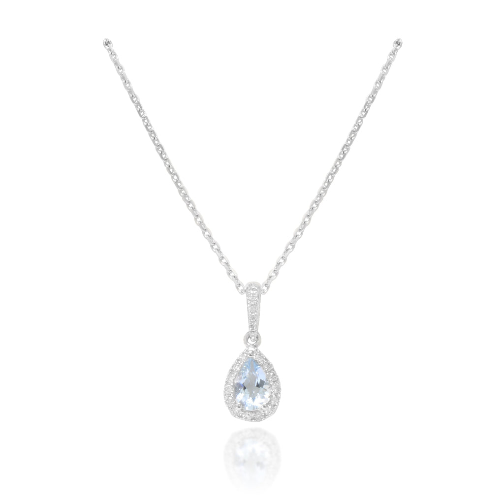 Collar realizado en oro blanco de 18 quilates con una aguamarina central y una orla de diamantes. Joyería Pamplona