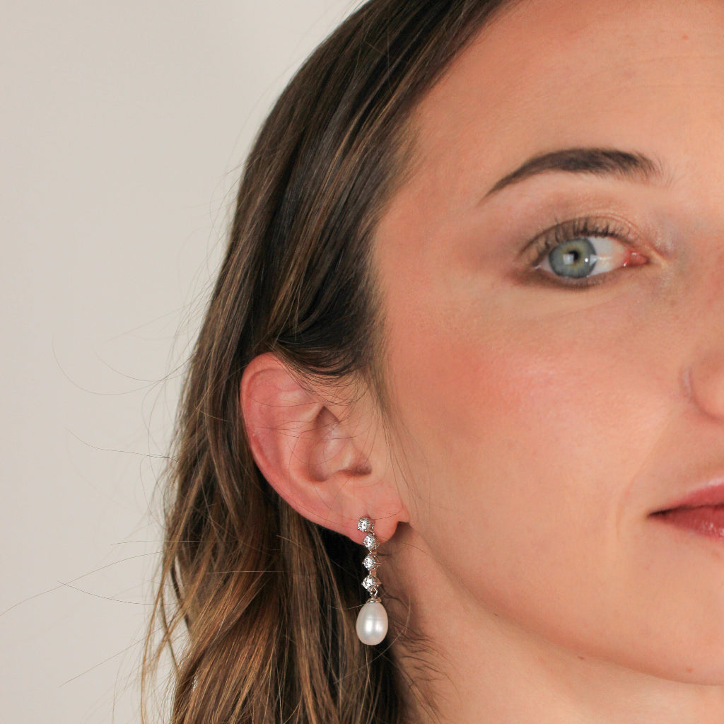 Pendientes de plata con circonitas y una perla