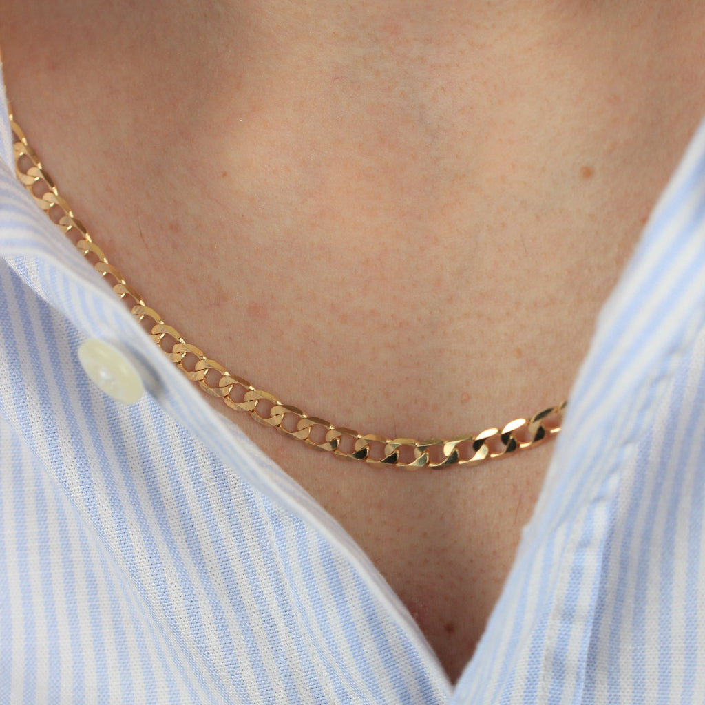 Cadena barbada de oro amarillo de 18 quilates para hombre.