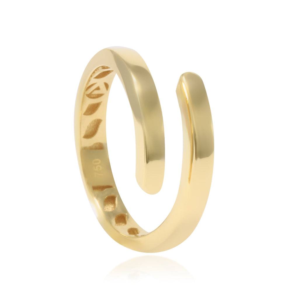 Sortija realizada en oro amarillo de 18 quilates con dos brazos.