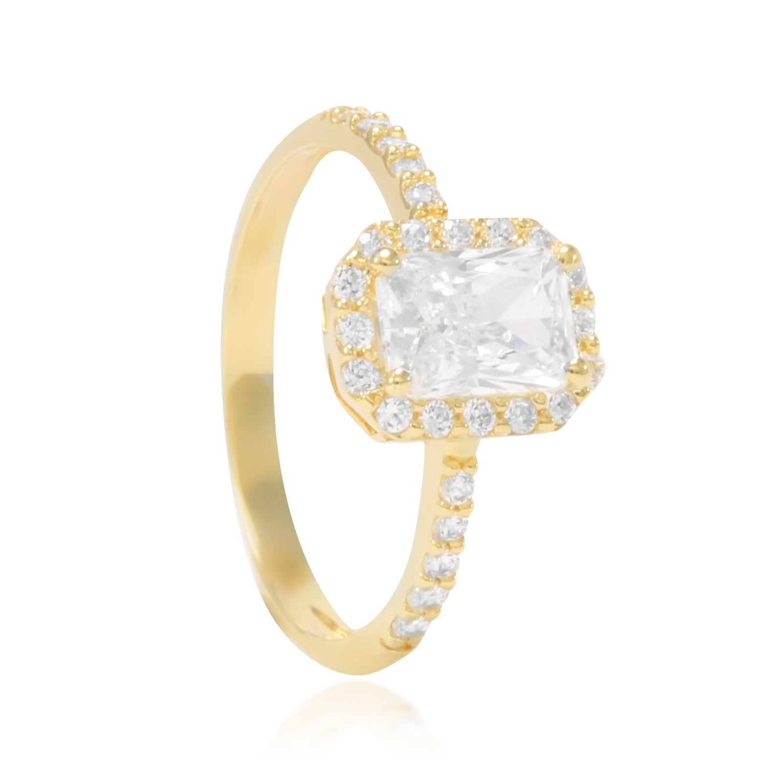 Sortija realizada en oro amarillo de 18 quilates con una circonita central, orla de circonitas y circonitas en los brazos.