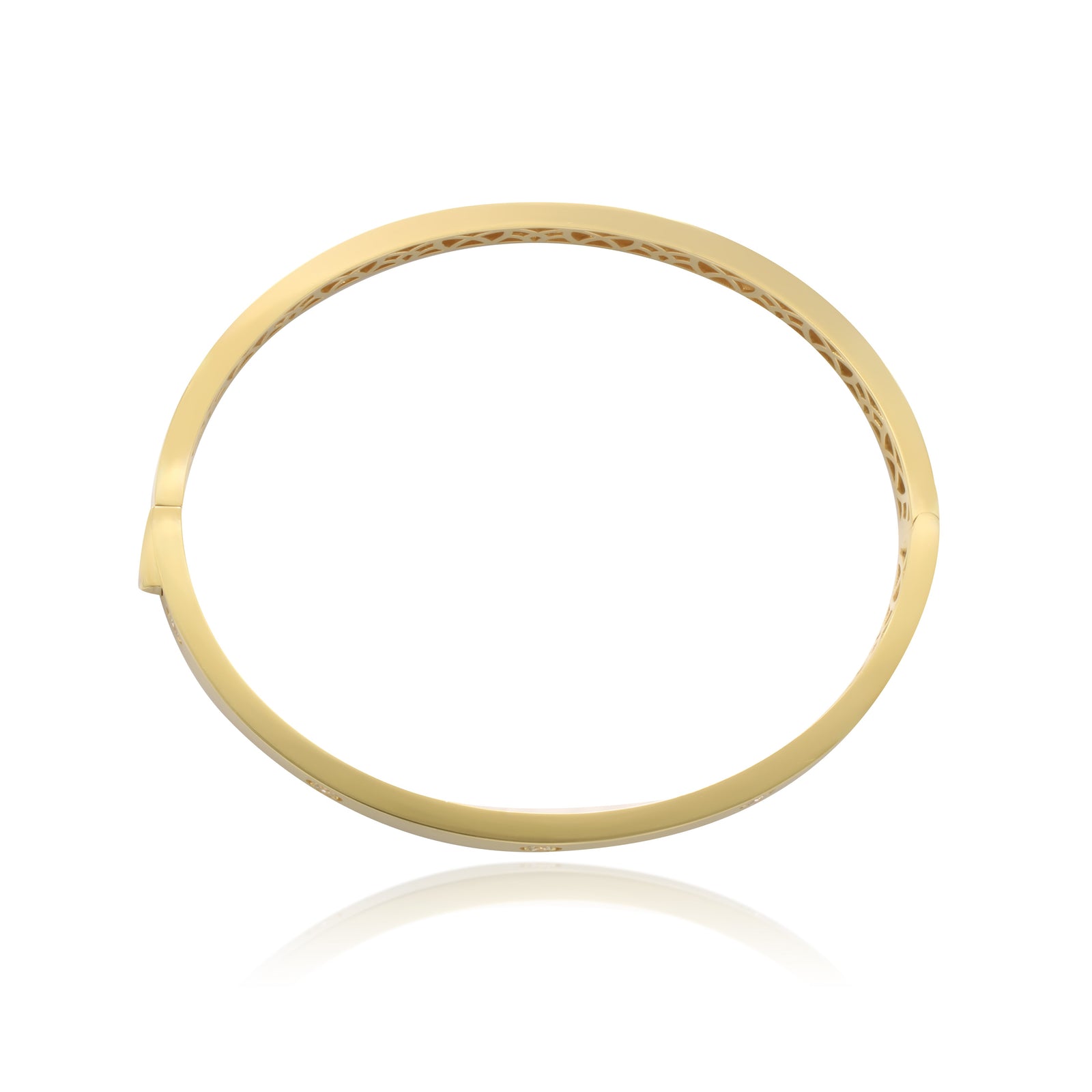 Pulsera rígida esclava realizada en oro amarillo de 18 quilates con circonitas.