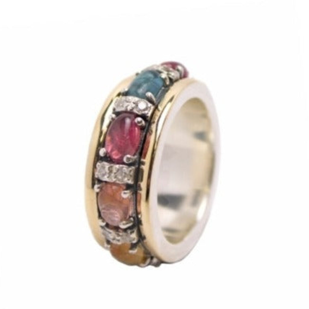 Alianza en plata de ley 925 y oro 9k con turmalina. Colección Gabriela Styliano.