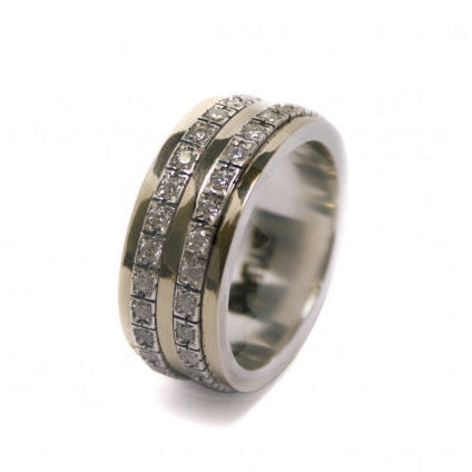 Alianza de plata de ley 925 y oro de 9 k con circonitas. Colección Gabriela Styliano.