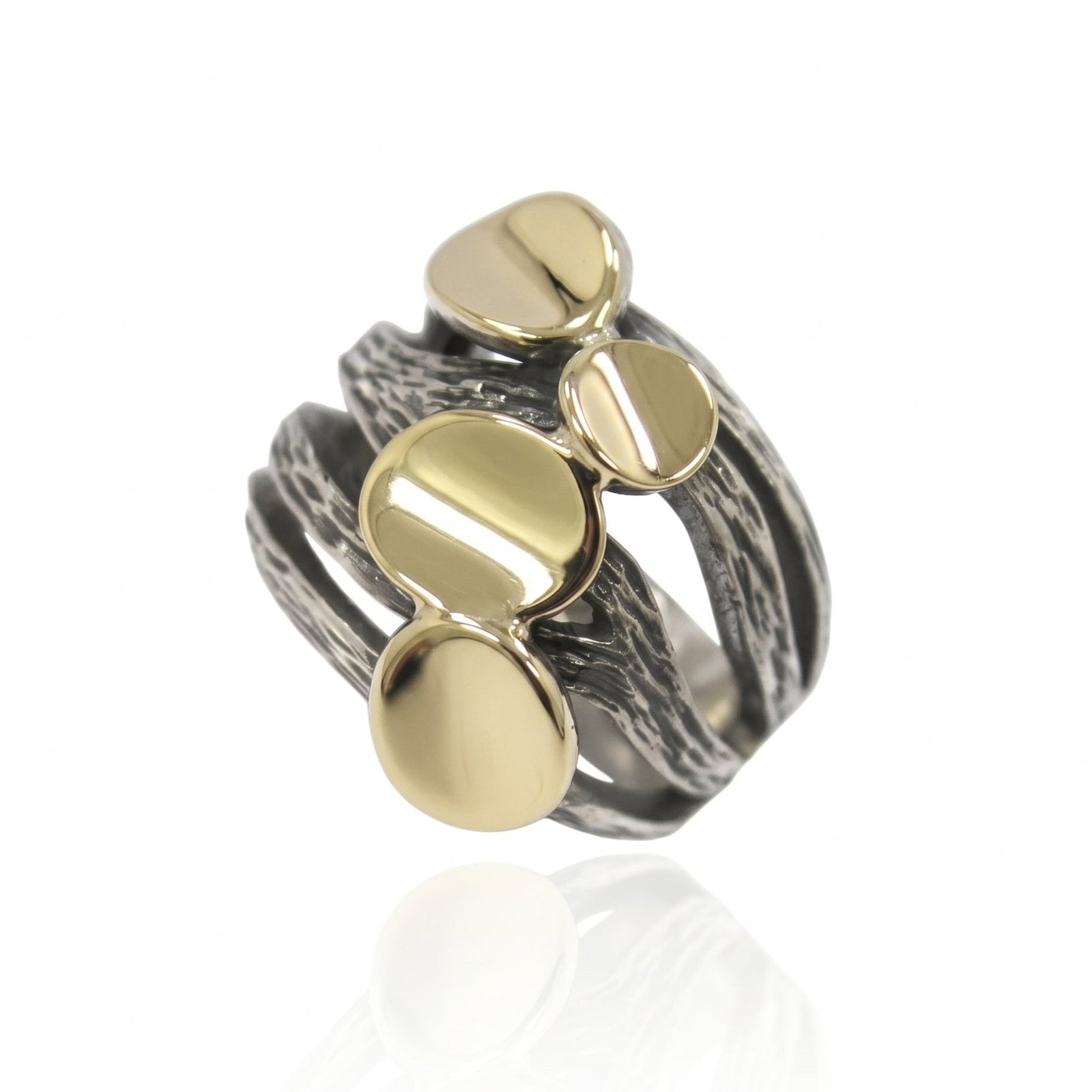 Anillo de plata de ley 925 y oro de 9kt. Colección Gabriela Styliano.