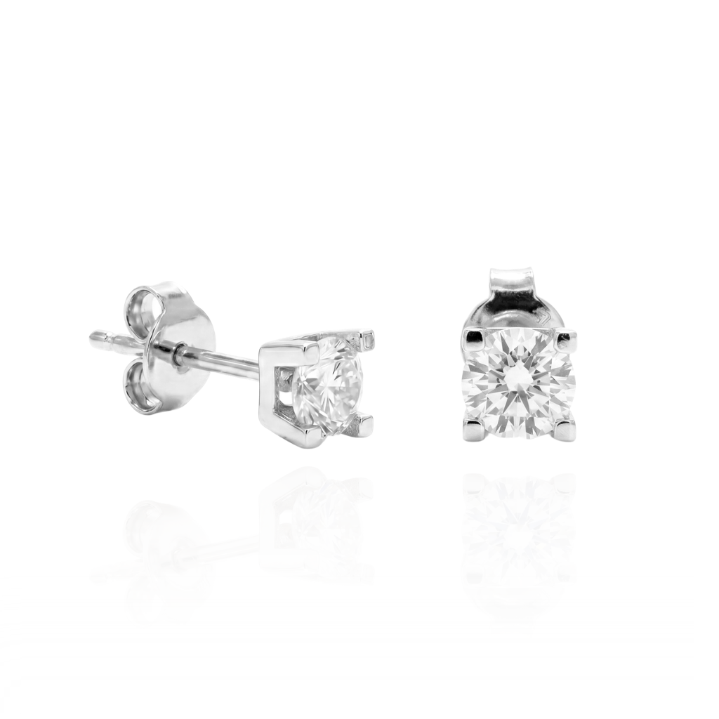 Pendientes de oro blanco de 18 quilates con circonita solitaria.