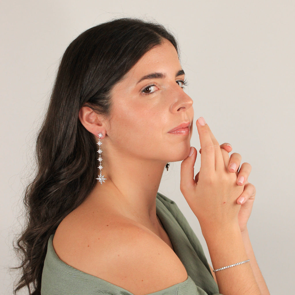 Pendientes largos de estrella en plata de primera ley con circonitas