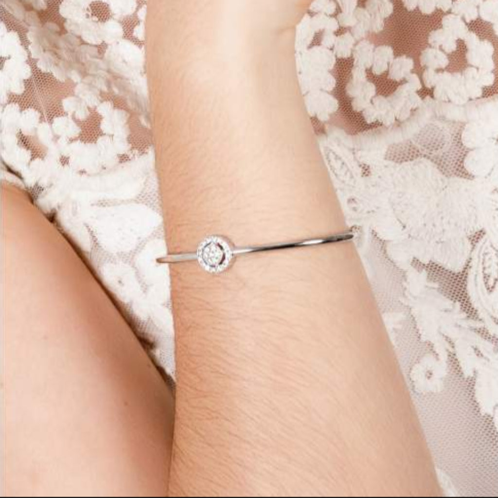 Pulsera semi rígida de plata de primera ley (925) con baño de rodio y circonita incolora