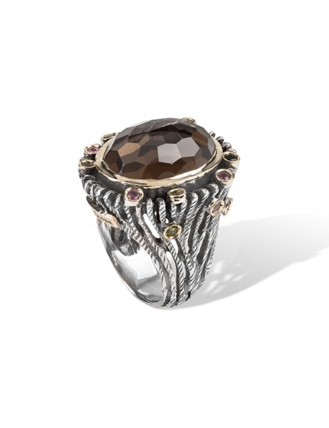 Anillo realizado en plata de primera ley (925) y oro 9 de quilates con cuarzo fumé y turmalinas multicolor.