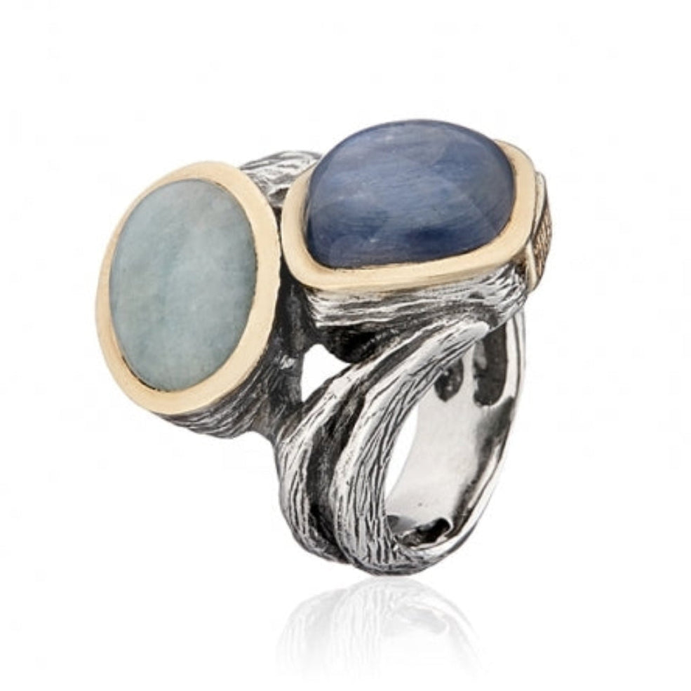 Anillo realizado en plata de primera ley (925) y oro 9 de quilates.