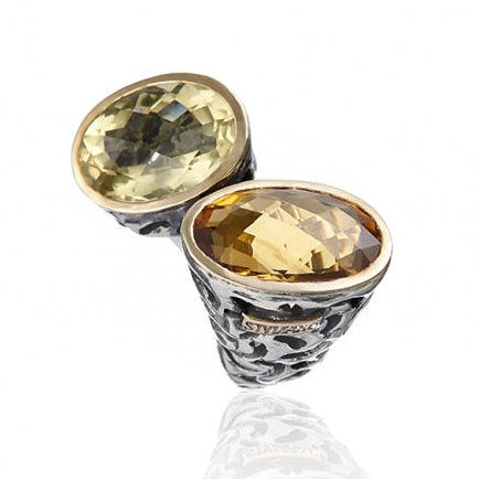 Anillo realizado en plata de primera ley (925) y oro 9 de quilates, cuarzo whisky y cuarzo golden.