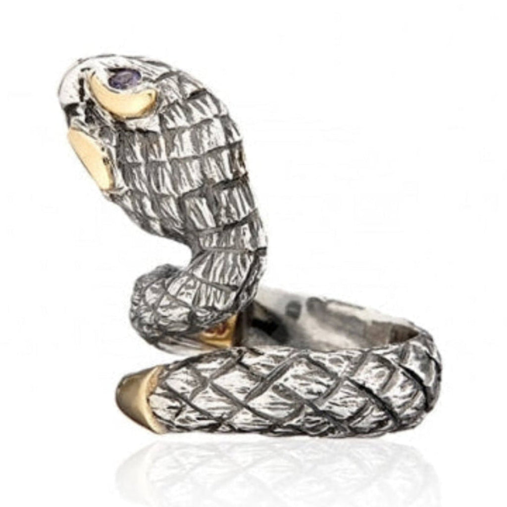 Anillo realizado en plata de primera ley (925) y oro 9 de quilates y Iolitas. Pamplona Styliano