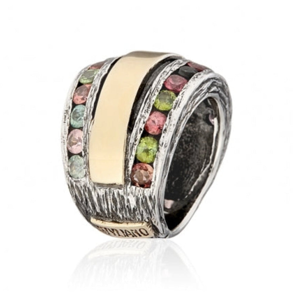 Anillo realizado en plata de primera ley (925) y oro 9 de quilates y turmalinas.