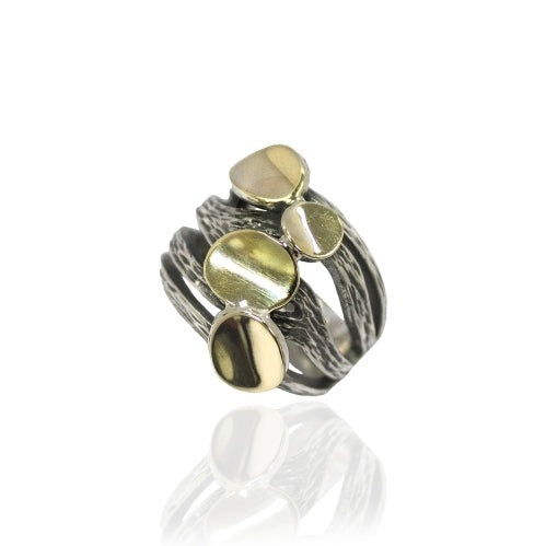 Anillo de plata de ley 925 y oro de 9 k. Colección Gabriela Styliano.