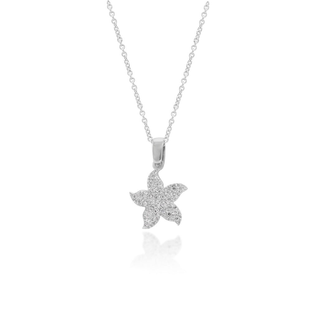 Collar realizado en oro de 18 quilates con un colgante de estrella de mar con circonitas