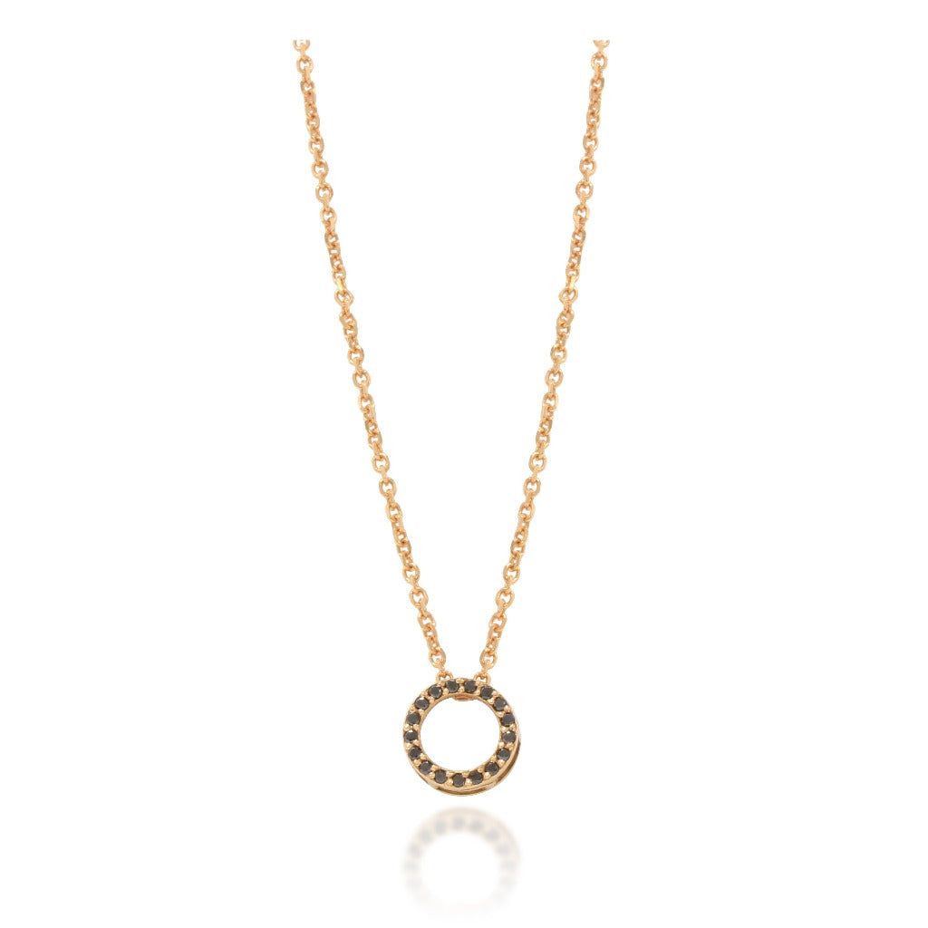 Colgante de oro rosa de 18 quilates circular cuajado de diamantes negros talla brillante. Joyería Pamplona.