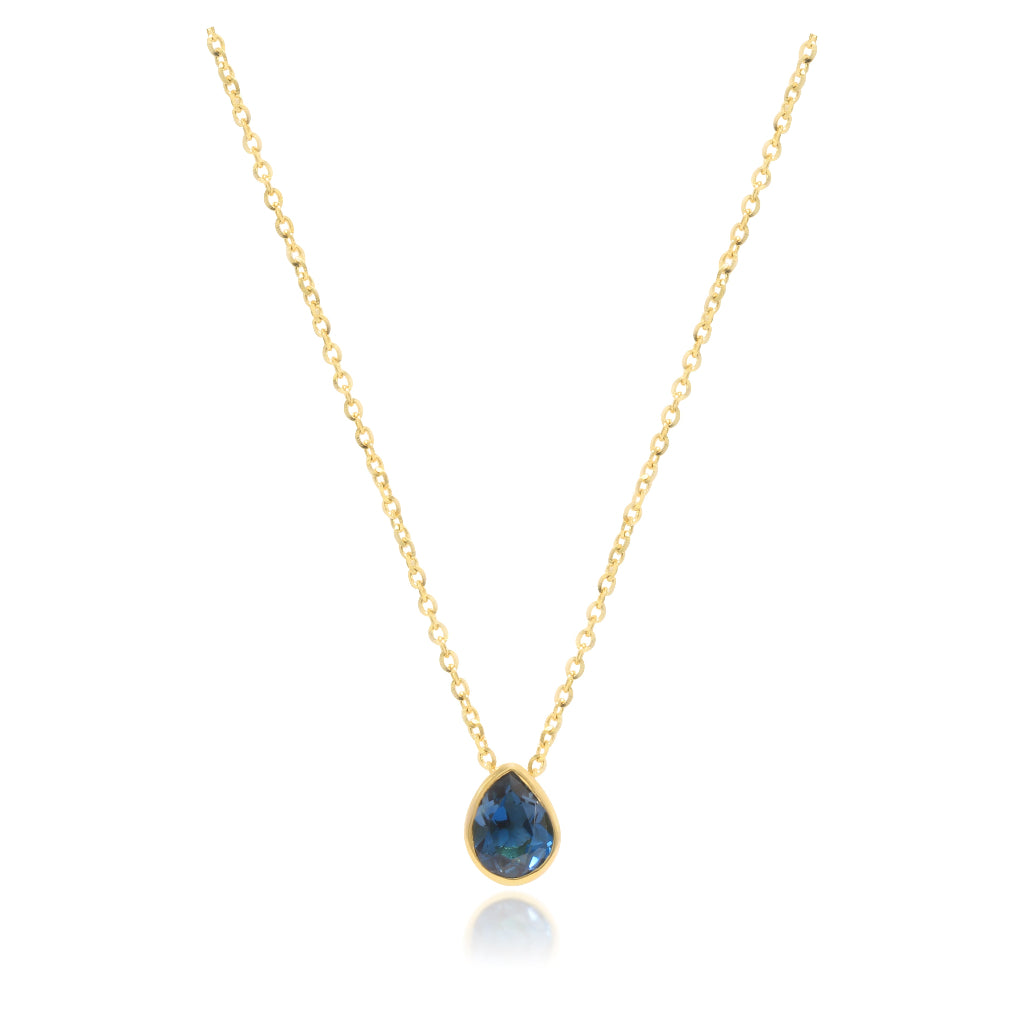 Collar realizado en oro amarillo de 18 quilates con un colgante de topacio azul London talla pera