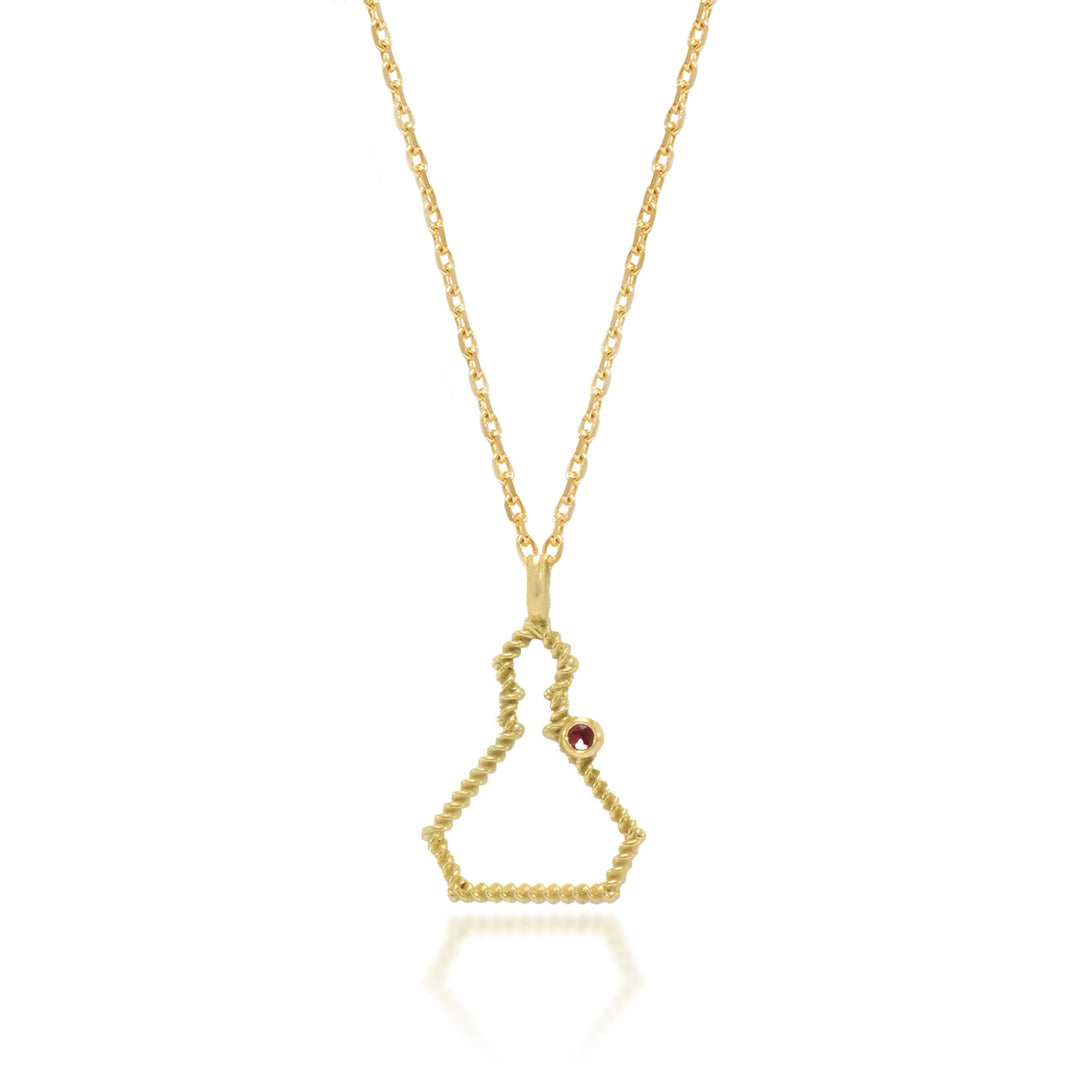 Collar realizado en oro amarillo de 18 quilates con la silueta de San Fermín en hilo trenzado y un rubí