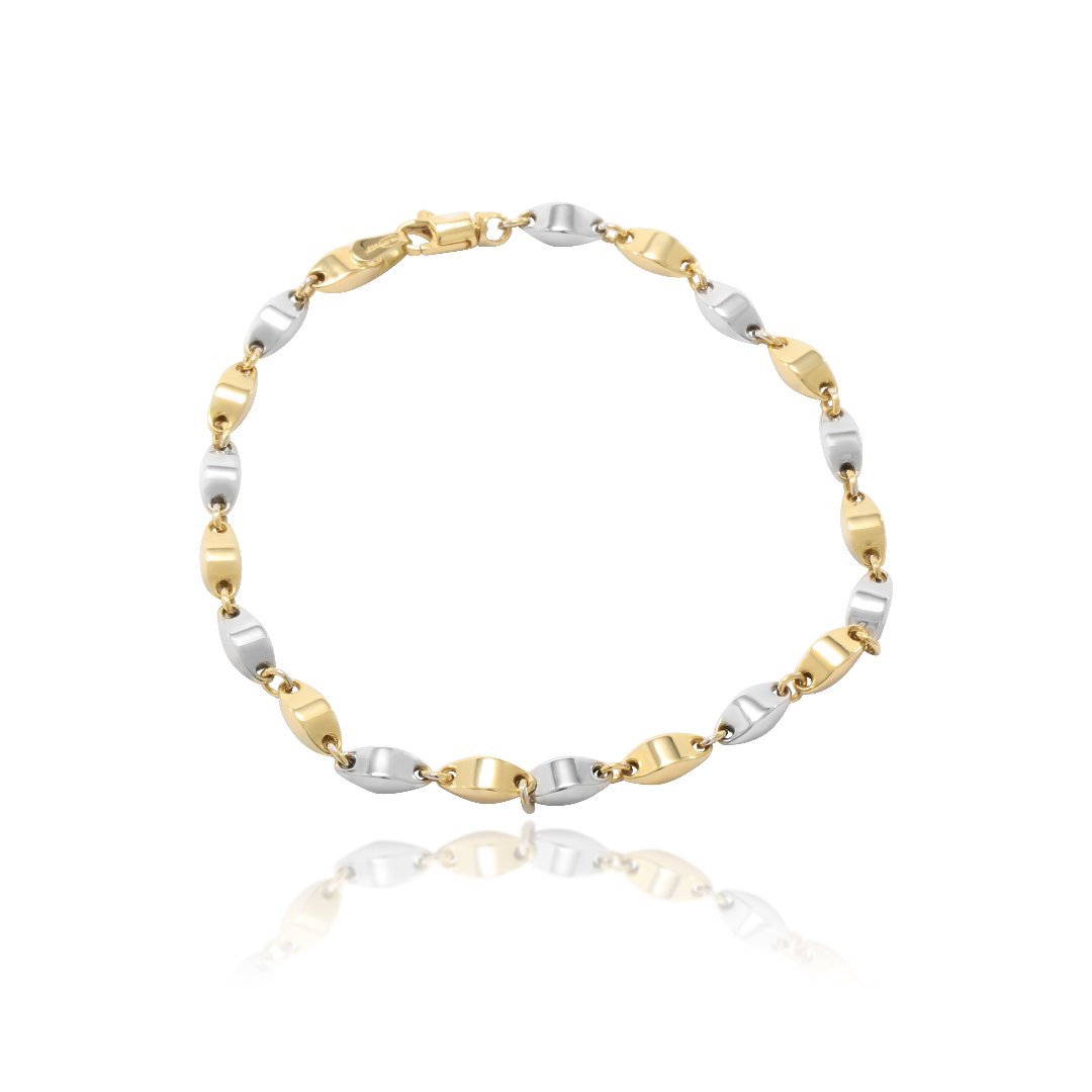 Pulsera bicolor realizada en oro amarillo y oro blanco de 18 quilates con pepitas ovales