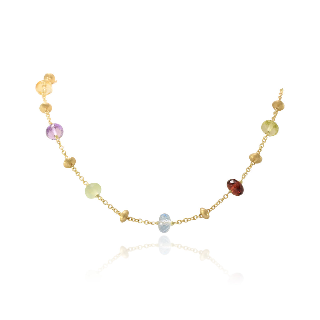 Gargantilla en oro amarillo de 18 quilates con piedras naturales en varios colores y motivos de oro matizados.