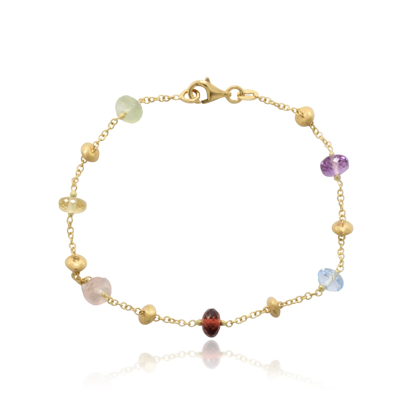 Pulsera realizada en oro amarillo de 18 quilates con motivos de oro y piedra natural de varios colores.