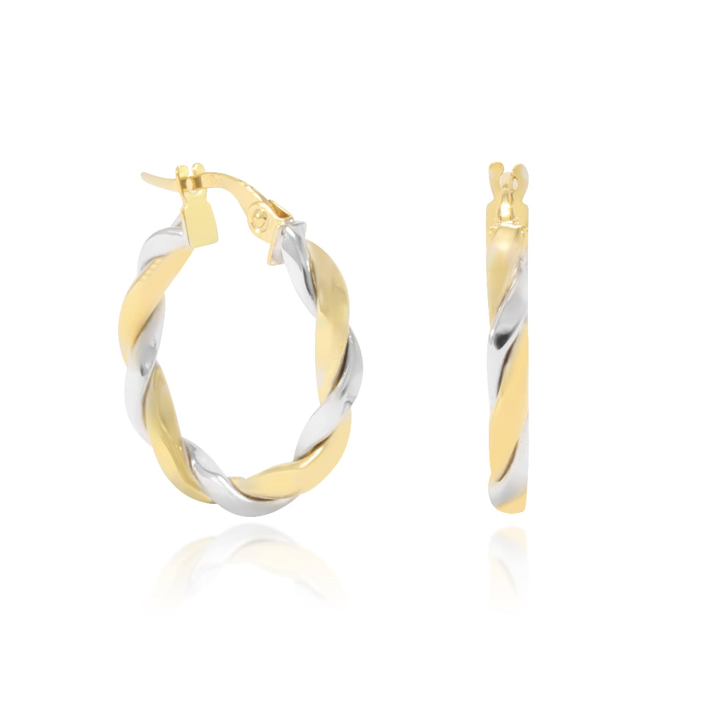 Pendientes de aro en oro blanco y amarillo de 18 quilates. El aro de doble tubo trenzado.