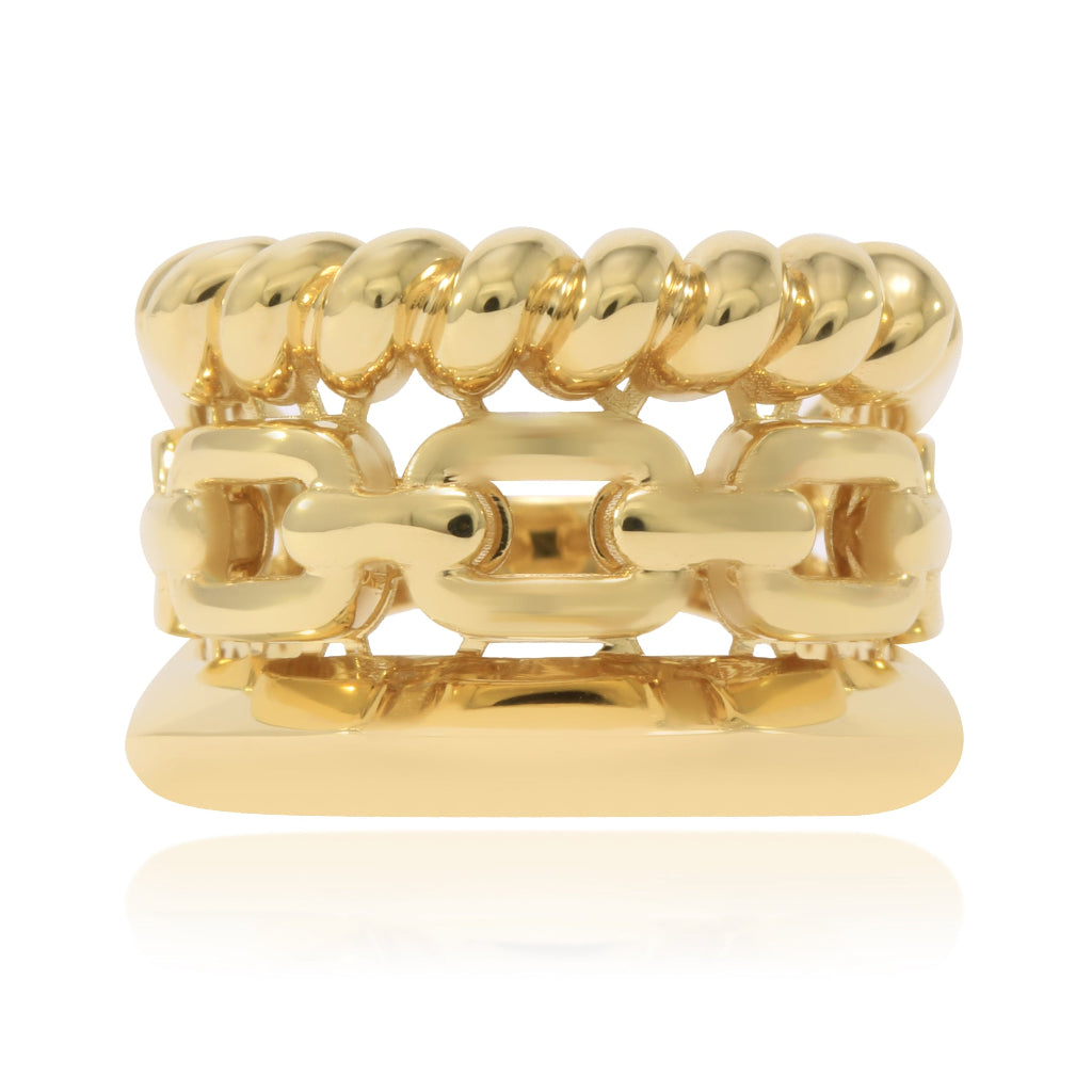 Anillo realizado en oro amarillo de 18 quilates con tres brazos con diferentes estilos.