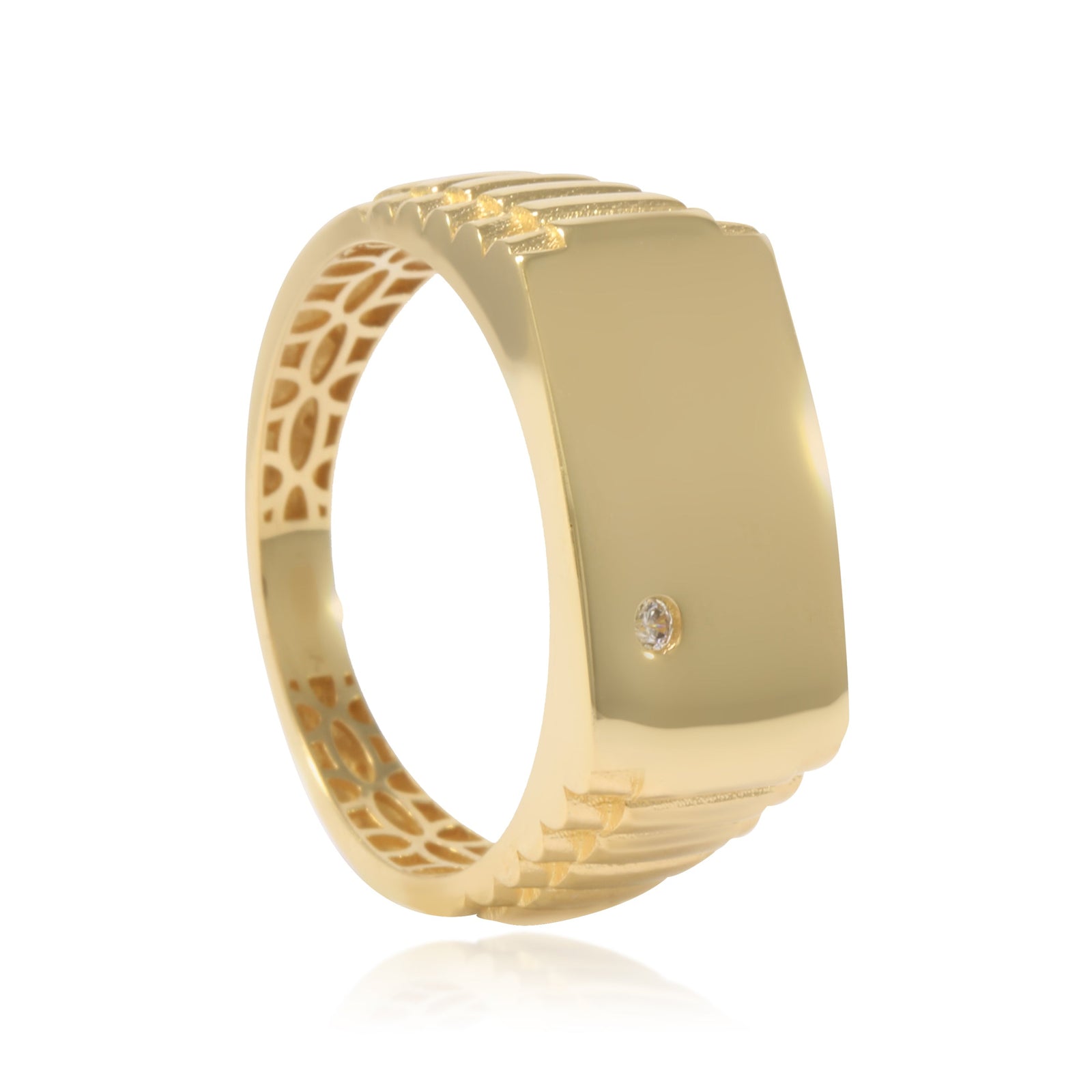 Sello rectángular con una circonita y brazo texturizado. Realizado en oro amarillo de 18 quilates.