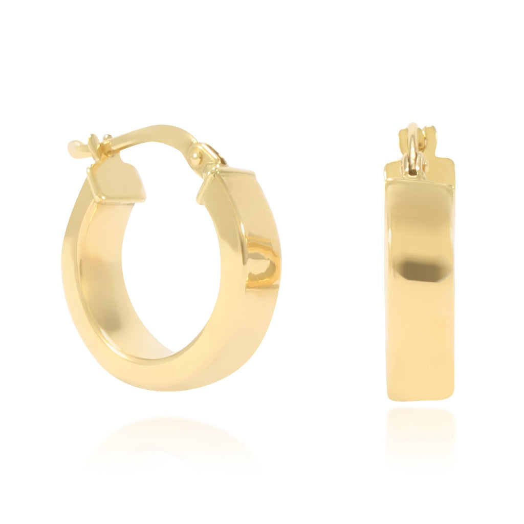 Pendientes de aro en oro amarillo de 18 quilates liso con forma aplanada.