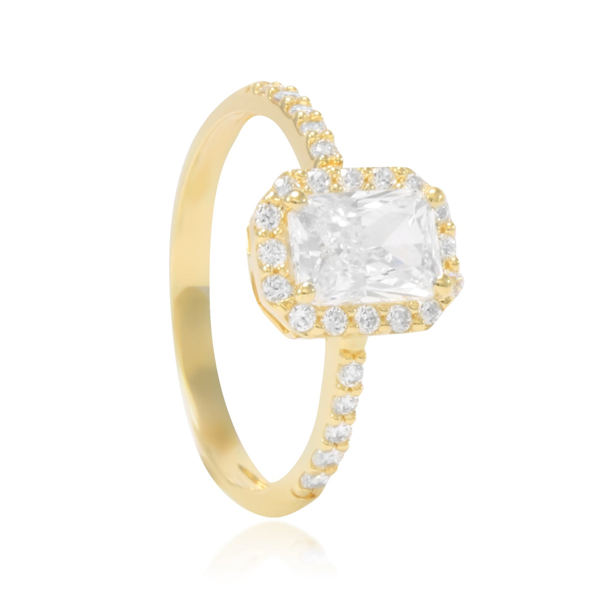 Sortija realizada en oro amarillo de 18 quilates con una circonita central, orla de circonitas y circonitas en los brazos.