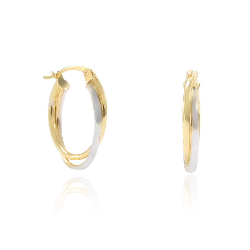 Pendientes de aro en oro blanco y amarillo de 18 quilates. El aro es doble con forma ovalada