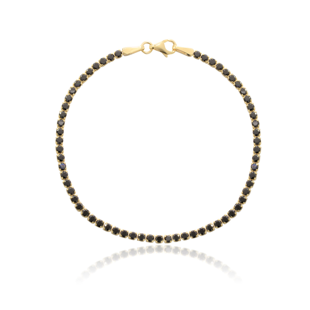 Pulsera realizada en oro amarillo de 18 quilates con circonitas negras.