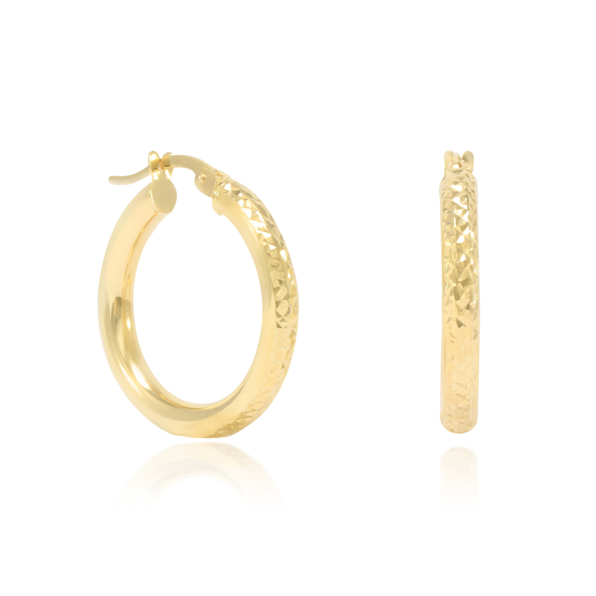 Pendientes de aro en oro amarillo de 18 quilates gruesos facetados.