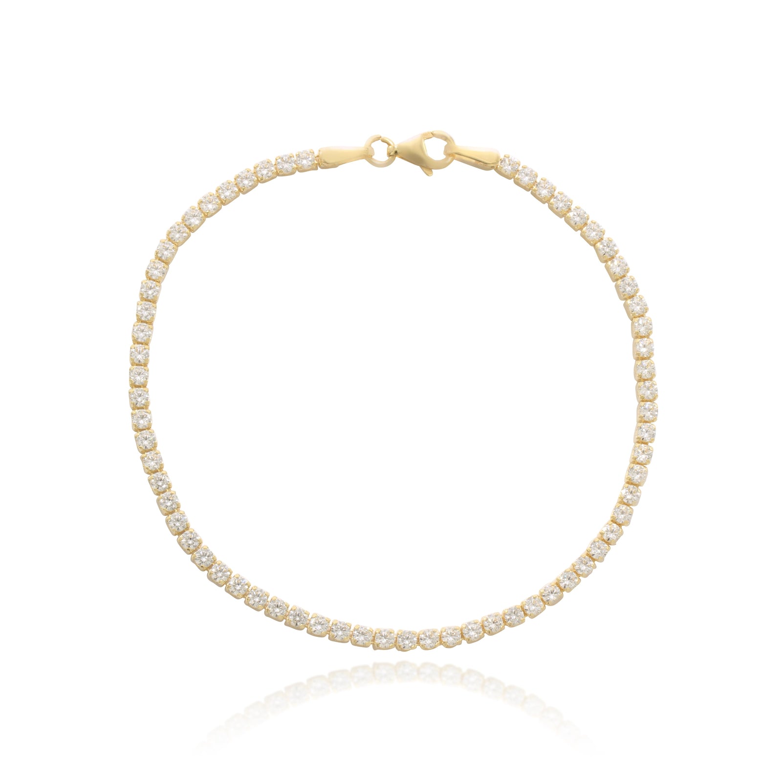 Pulsera realizada en oro amarillo de 18 quilates con circonitas incoloras.