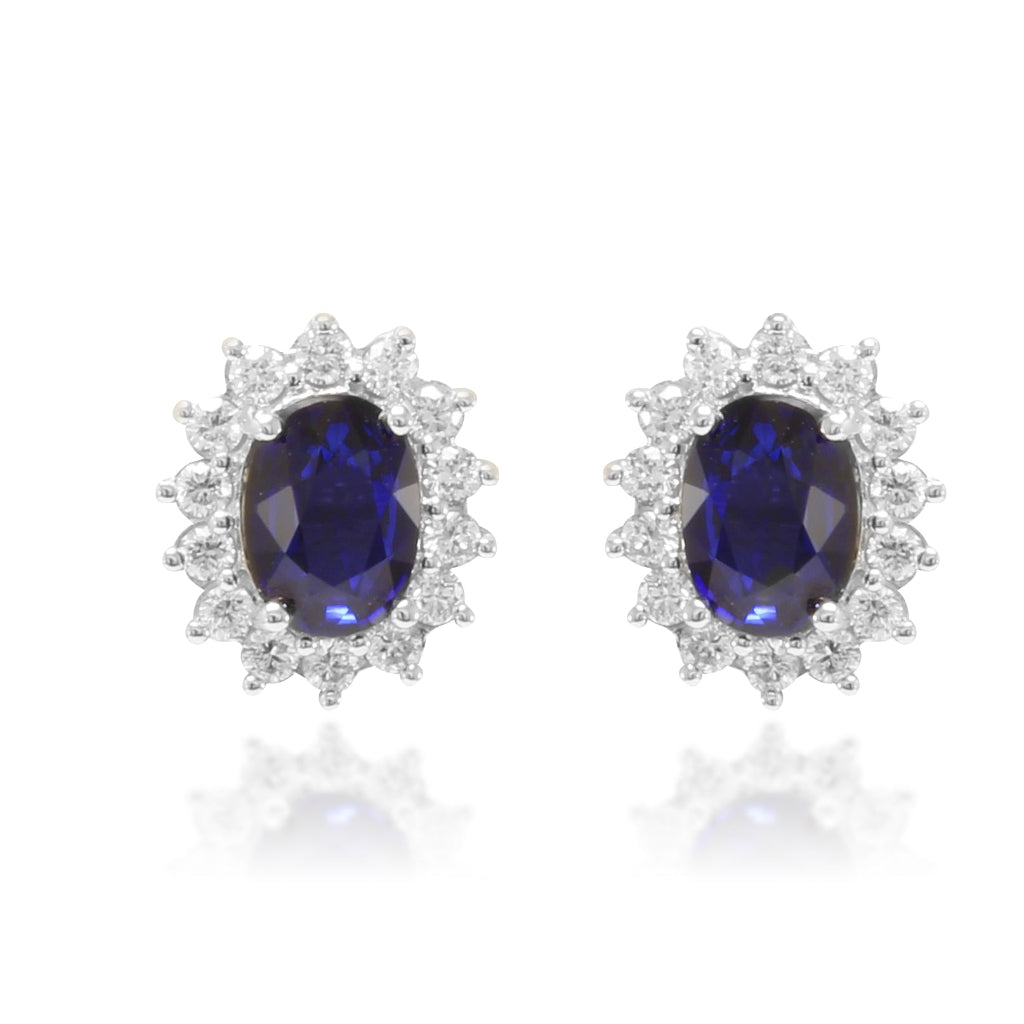 Pendientes estilo Lady Di realizados en oro blanco de 18k con diamantes y zafiro azul