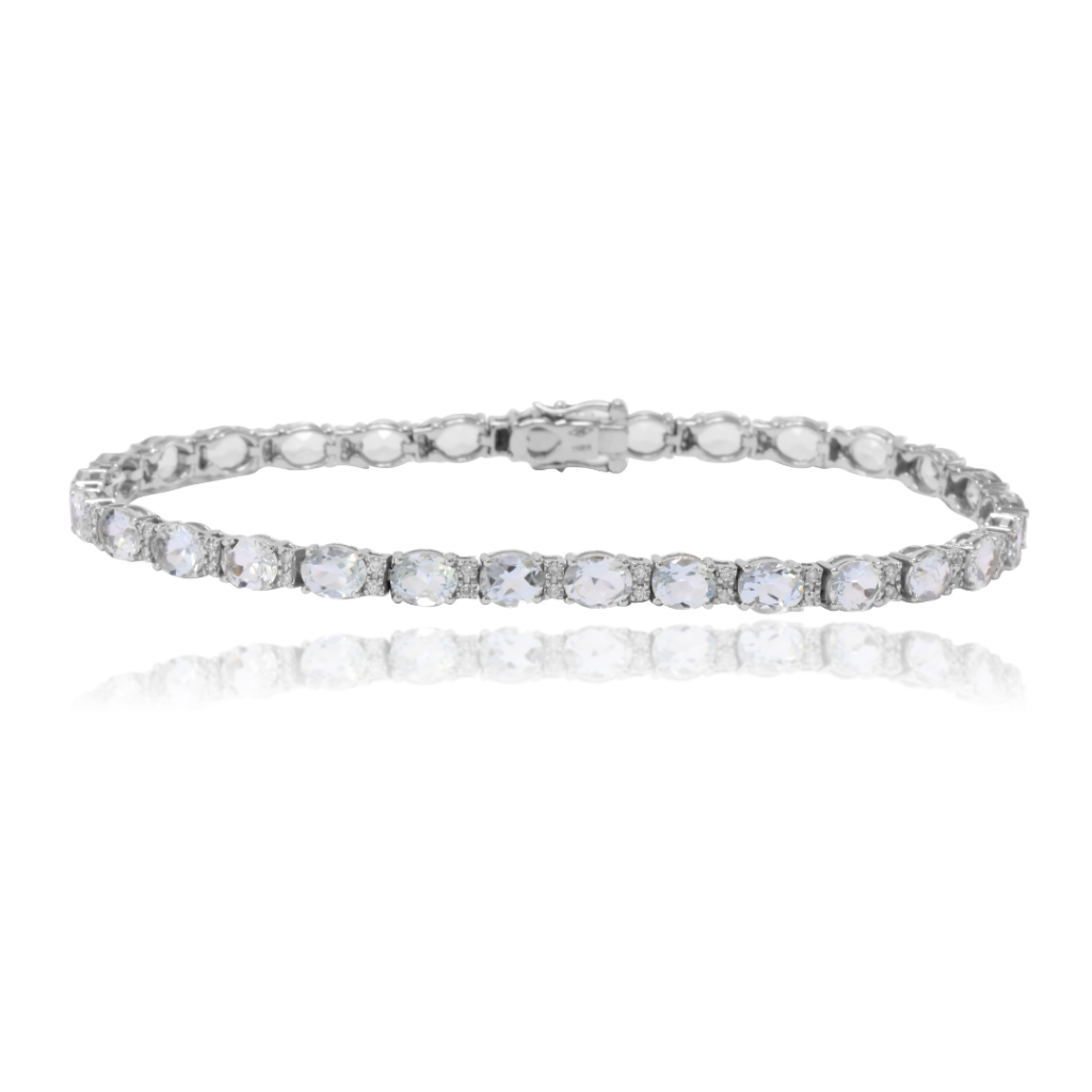 Pulsera de oro blanco de 18k con aguamarinas y diamantes