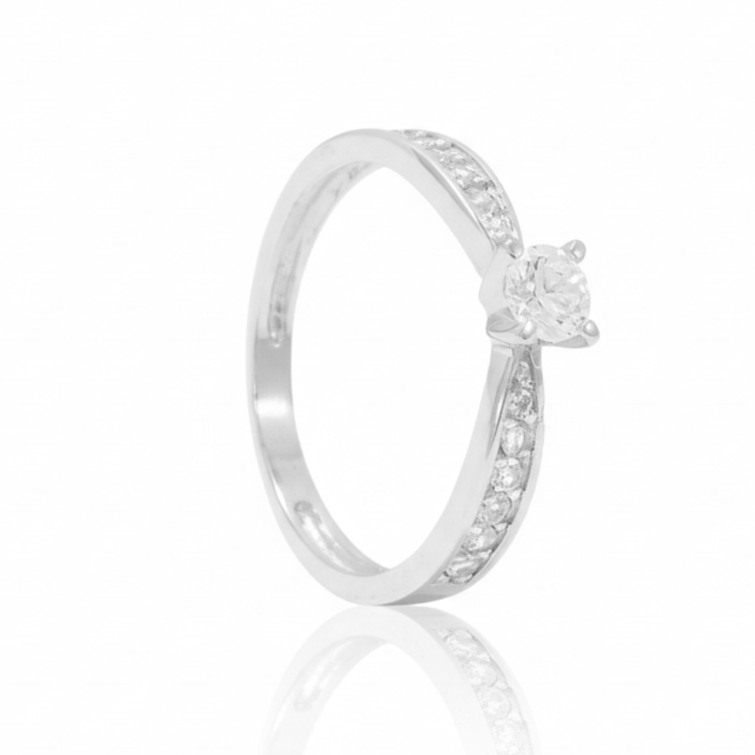 Anillo oro blanco 18k con circonita central y laterales