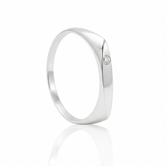 Anillo minimalista de oro blanco 18k con un diamante