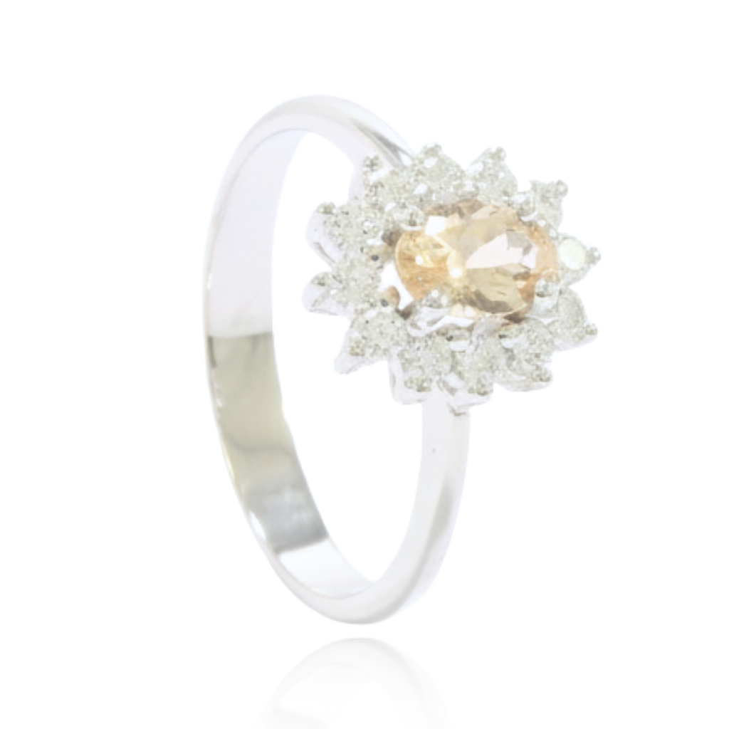 Anillo de compromiso estilo Lady Di con morganita y halo de diamantes realizado en oro blanco de 18 quilates