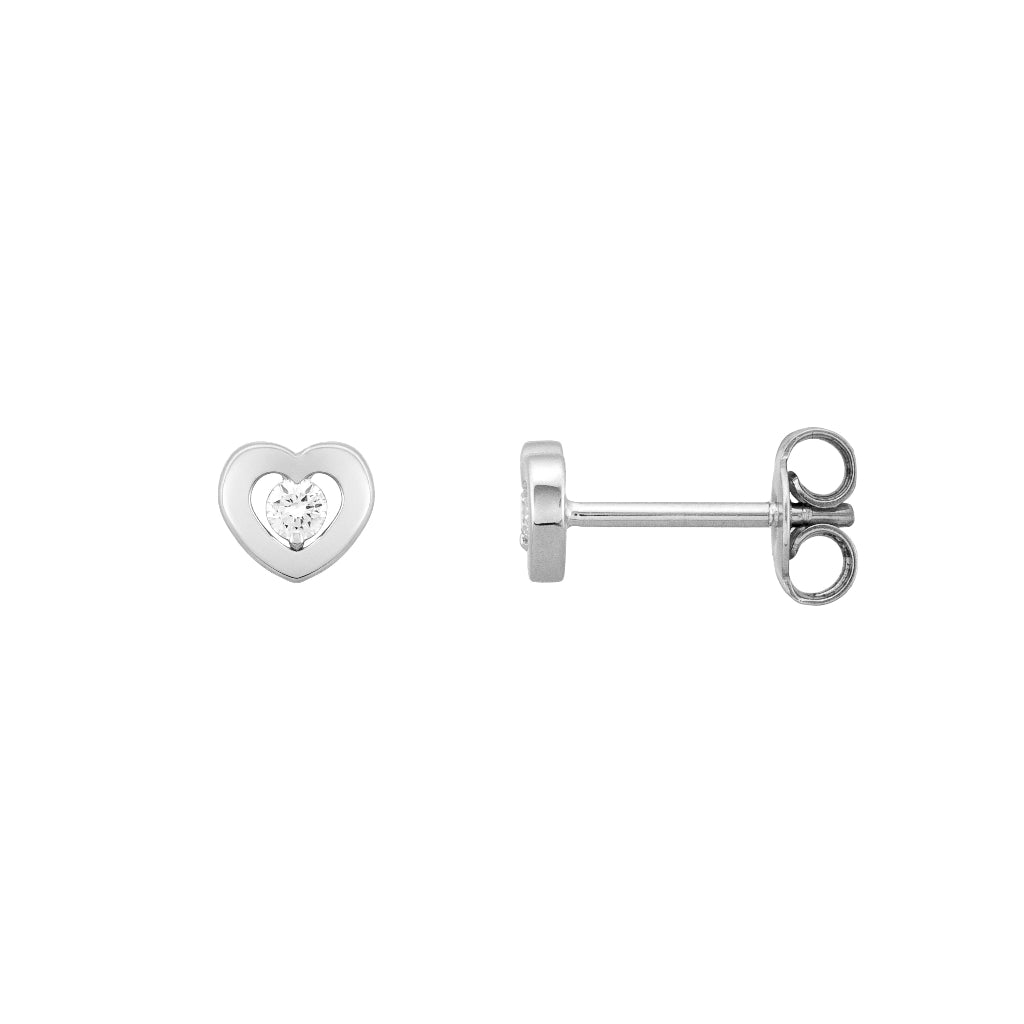 Pendientes en oro blanco de 18 quilates en forma de corazón con diamante central de un peso total de 0,1cts. Joyería Pamplona.