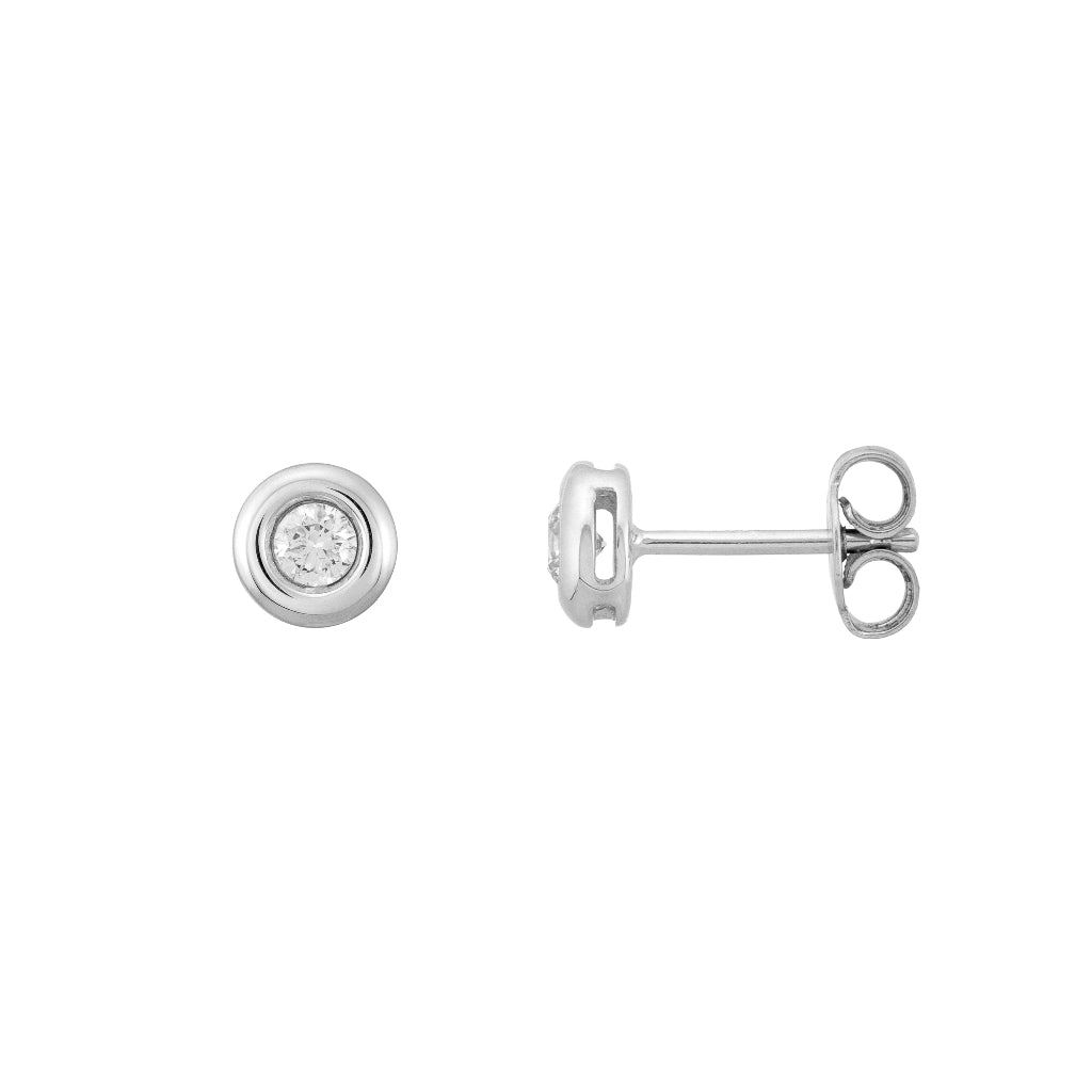 Pendientes en oro blanco de 18 quilates con un solitario de diamante engastado en chatón. Joyería Pamplona.