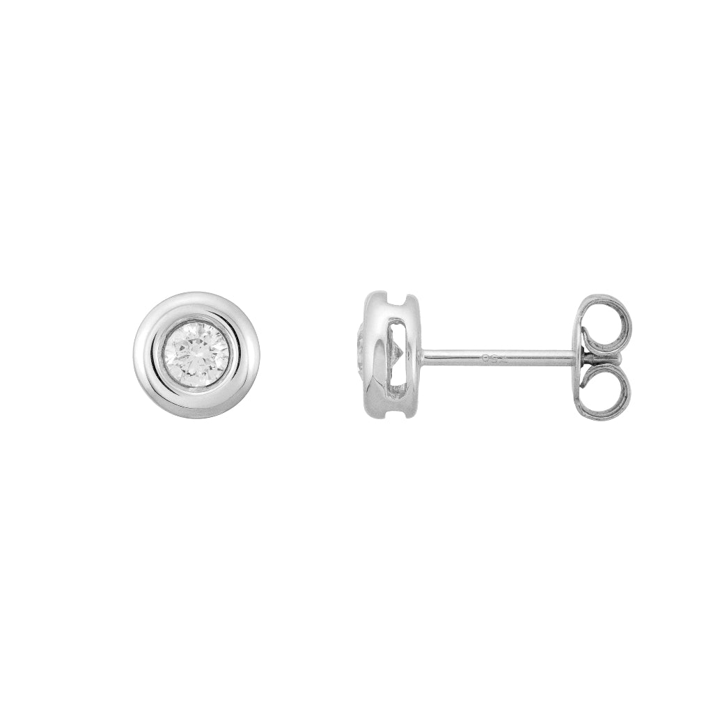 Pendientes en oro blanco de 18 quilates con un solitario de diamante engastado en chatón. Joyería Pamplona.