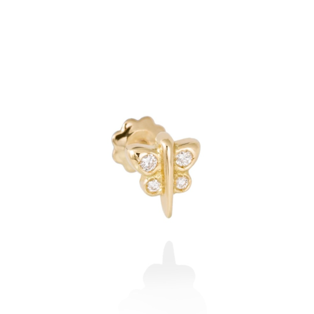 Piercing realizado en oro de 18 quilates con circonitas.