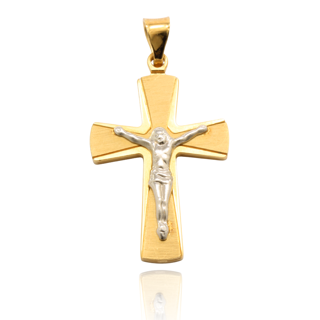 Colgante de cruz elaborado en oro amarillo y oro blanco de 18k con figuta de cristo en relieve