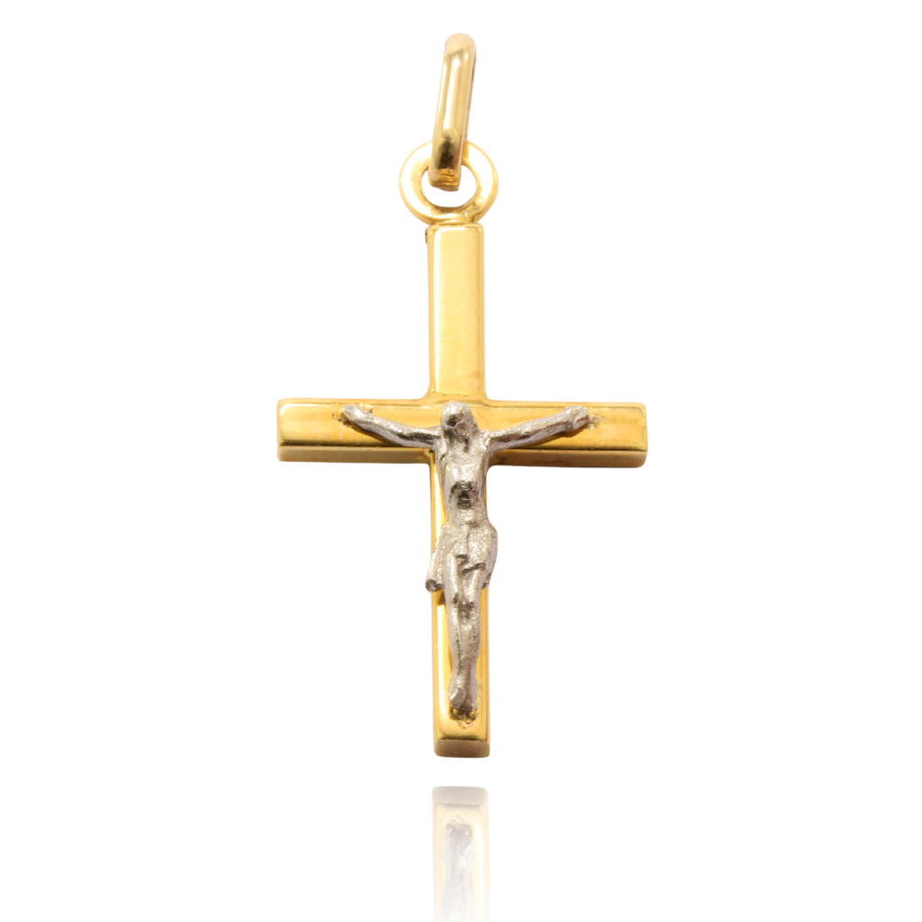 Cruz realizada en oro amarillo de 18k con cristo en relieve 