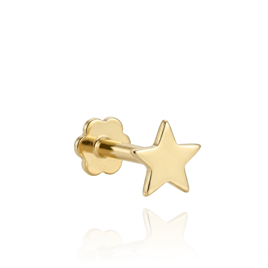 Piercing realizado en oro de 18 quilates.