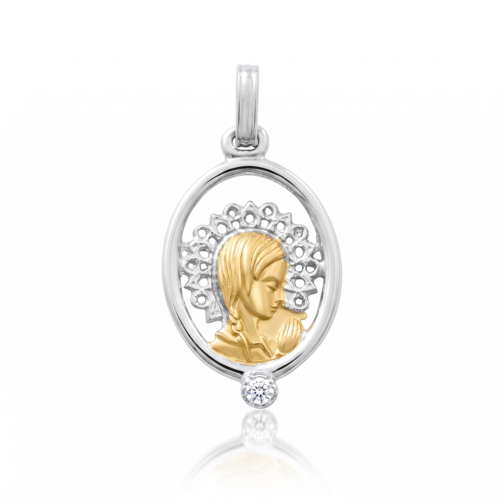 Medalla realizada en oro blanco y oro amarillo de 18K con una circonita en la parte inferior
