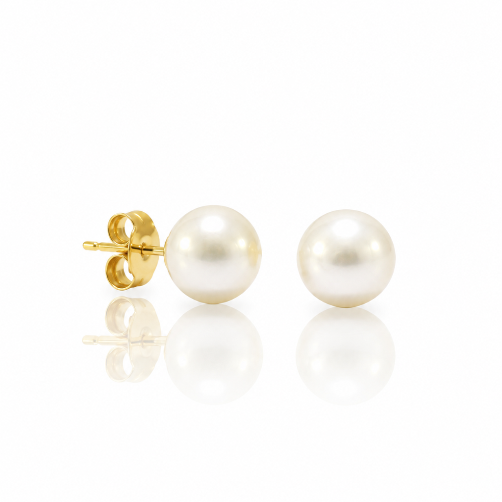 Pendientes de perla Akoya con pernio y presión en oro amarillo de 18 kt.