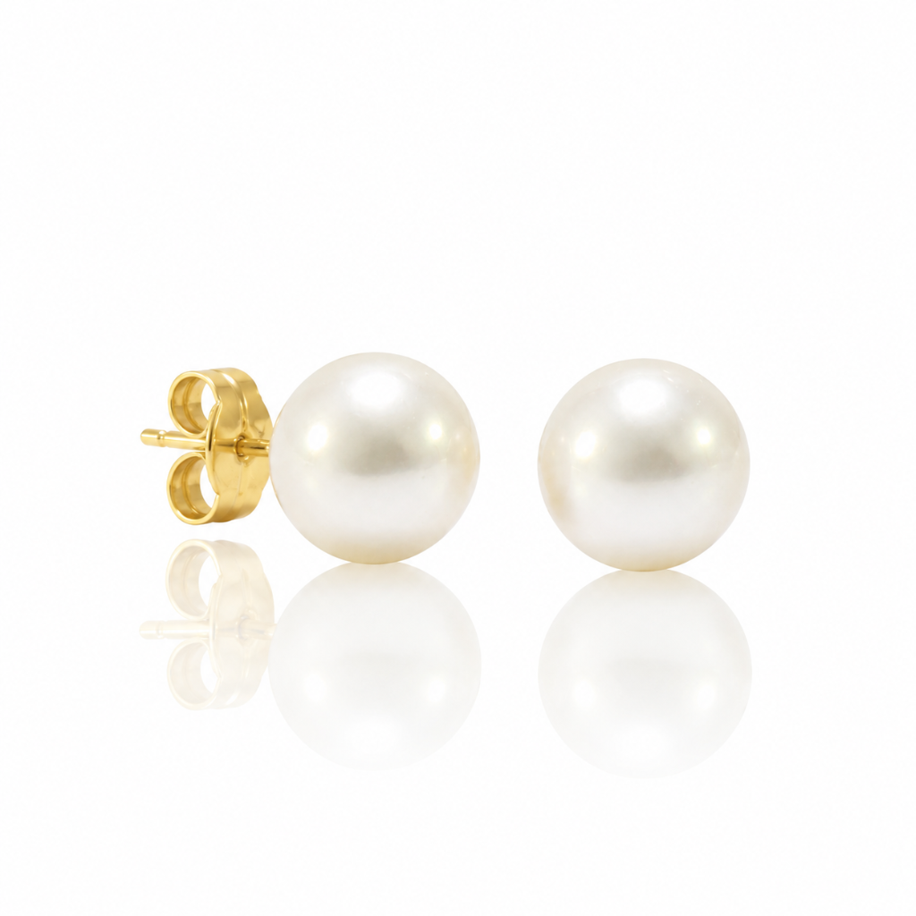 Pendientes de perla Australiana con pernio y presión en oro amarillo de 18 kt.