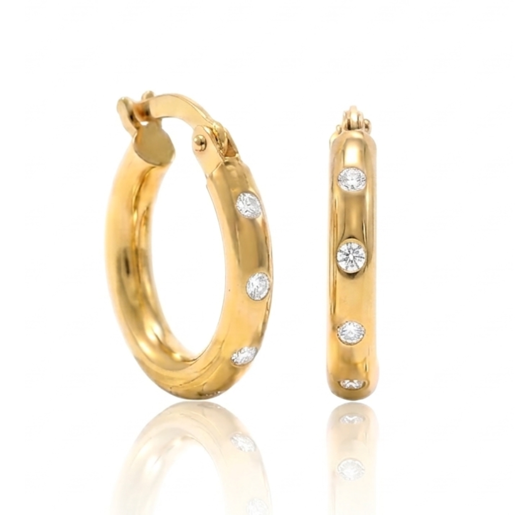 Pendientes de aro en oro amarillo de 18 quilates.
